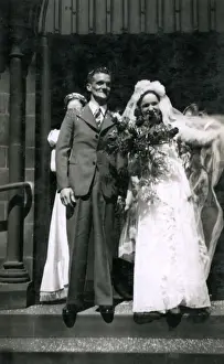 Bridesmaid Prints: Newly married couple on church steps