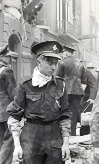 Messenger Prints: NFS messenger boy at Pimlico bombing, WW2