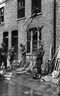 Sprung Prints: NFS personnel in salvage operation, WW2