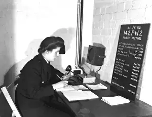 Operator Prints: NFS radio operator at Ealing HQ (34 D), WW2