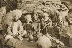Steppe Prints: A Nomadic family group from Turkmenistan - inside their yurt