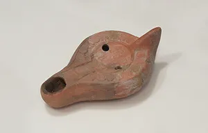 North African red-ware lamp, 4th-6th century A.D