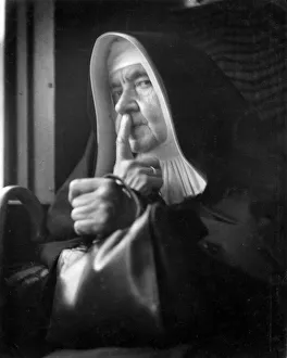 Images Dated 26th May 2017: Nun looking at the camera