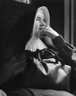 Thoughtful Prints: Nun sitting looking thoughtful