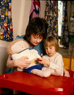 Demonstrating Gallery: Nurse with child and doll