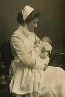 Caring Prints: Nurse cradling baby