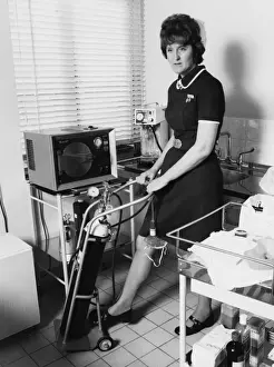 Nurse with equipment at the Medical Centre, Hendon