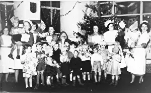 Britain British Nurse Nurses Medicine Prints: Nurses, Father Christmas and children at Christmas party