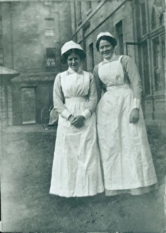 Nursing Gallery: Two nurses outside institution