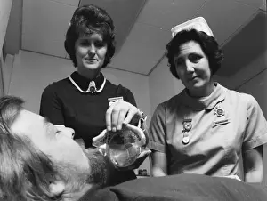 Oxygen Prints: Nurses and patient at the Medical Centre, Hendon