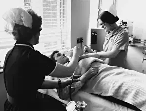 Nurses and patient at the Medical Centre, Hendon