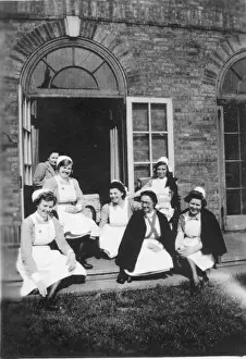 New Images July 2020 Prints: Six nurses and woman on steps