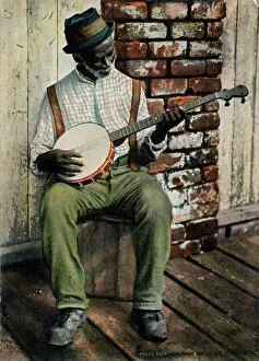 Pictures, old black man playing banjo