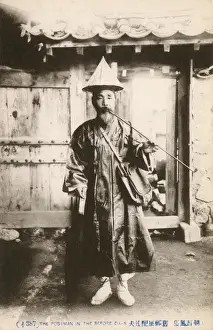 Delivering Prints: Old Chinese Postman in Traditional attire