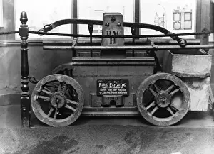 Loan Prints: Old Dutch fire engine in a museum