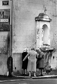 Old ladies on corner of Rue de la Cite in Cergy Pontoise