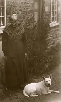 Old lady with a white dog