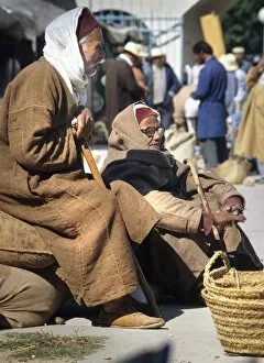 Tunisian Collection: Two old men with djellebas and chechia hats