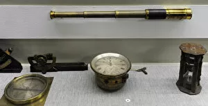 Old navigational instruments. Vintage telescope, compass, ho