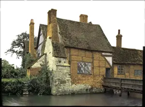 Old timbered house by a river
