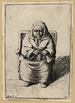 Rembrandt Prints: Old woman sitting in a chair knitting, 17th century