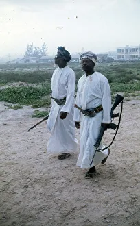 Images Dated 19th July 2016: Omani elders wearing Khanjar and carrying rifles in Oman