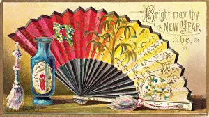 Ornate fan and blue vase on a New Year card