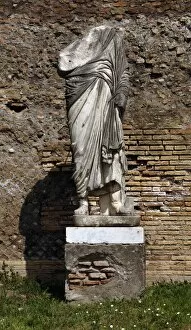 Images Dated 5th April 2009: Ostia Antica. Forum. Statue