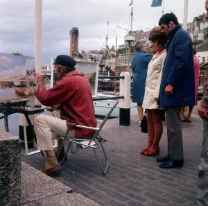 Brixham Prints: Outdoor painter working on Brixham Harbour, Devon