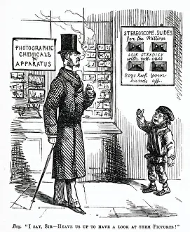 Images Dated 6th January 2021: Outside a photographic establishment - I say, sir - heave us up to have a look at