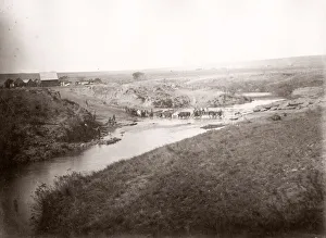Ox drawn wagon crossing river, South Africa