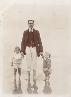 Three paddlers at Scarborough, North Yorkshire