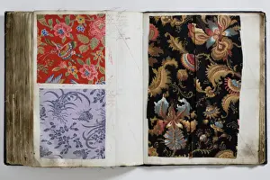 Pages from a book of textile samples, annotated by hand with