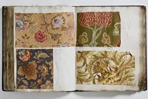 Pages from a book of textile samples, annotated by hand with