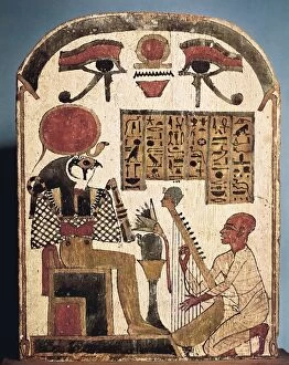 Amon Gallery: Painted wood stele depicting Amon musician playing