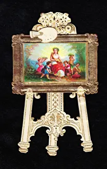 Painting on an easel on a cutout greetings card