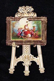 Painting on an easel on a cutout greetings card