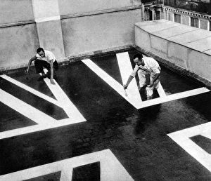 Painting the Embassy roof with a Union Flag, Madrid; Spanish Painting the Embassy roof with a Union Flag, Madrid; Spanish