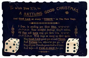 Pair of dice with comic verse on a Christmas card