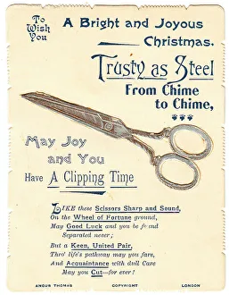 Puns Prints: Pair of scissors with comic verse on a Christmas card