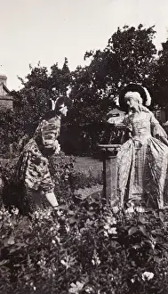 Sundial Prints: Pair by sundial in eighteenth century costume