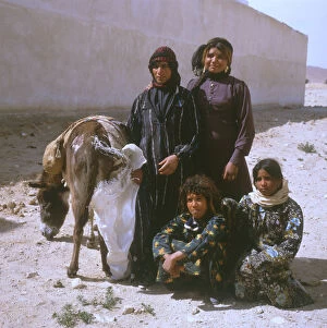 Kanus Collection: Palmyra, Syria - A Group of Bedouin Women and a donkey