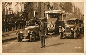 Controls Collection: Parisian Officer directing traffic on Les Grand Boulevards