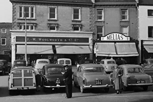 Parking Gallery: A parking attendant writing out ticket, Middlesex