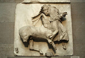Defeated Gallery: Parthenon. Metope XXIX. Centaur holding a fighter defeated