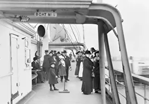 Comus Prints: Passengers and children playing quoits on deck of Steamer Co
