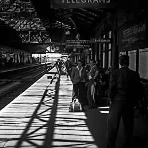 Await Gallery: Passengers on platform, Peterborough North station