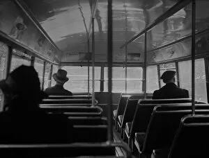 Passengers on upper deck of London Transport bus