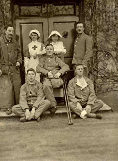 Five patients and two nurses outside Quex House Five patients and two nurses outside Quex House