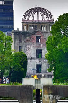 Images Dated 5th July 2015: Peace flame and Genbaku Domu, Atomic Bomb Dome, Hiroshima